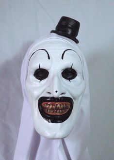 Hello, we have for you Terrifier Latex Mask. Handmade from Sculpture to the final result. To use in fun times with your Friends, such as Parties, Halloween, Christmas, Comic Conventions or just as a fan to Collect. Read carefully before buying: The Masks is only adult size 63 cm. Approximate inner diameter. We use the best Materials, painted with Airbrush and details with brush. Every single piece, the color of the skin can change. They have holes to see and breathe well. The price includes mask Novelty Masks And Prosthetics For Halloween, Novelty Masks And Prosthetics For Halloween Costume, White Masks And Prosthetics For Carnival Cosplay, Novelty Halloween Costume Masks And Prosthetics, White Cosplay Costume For Carnival, White Carnival Cosplay Costume, Halloween White Masks And Prosthetics For Costume Party, White Masks And Prosthetics For Carnival Costume Party, White Masks For Carnival Costume Party