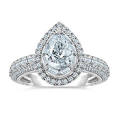 a pear shaped diamond engagement ring set in 18k white gold