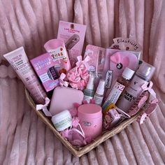 a basket filled with lots of pink items