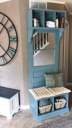 a room with a bench, mirror and clock on the wall