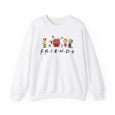 Get into the festive spirit with this Peanuts Friends Christmas sweatshirt. Made with a cozy medium-heavy fabric blend of 50% cotton and 50% polyester, this sweatshirt features a ribbed knit collar and classic fit for a comfy wearing experience. Perfect for those colder months, this sweatshirt is durable and itch-free, making it a must-have for the holiday season. Ideal for fans of Peanuts and Christmas enthusiasts. Product features - 50% cotton and 50% polyester fabric blend for coziness - Ribb Winter Cotton Tops With Character Print, Winter Cotton Sweater With Character Print, Cotton Winter Sweater With Character Print, Casual Winter Sweater With Character Print, Cotton Sweatshirt With Character Print For Loungewear, Character Print Cotton Sweatshirt For Loungewear, Winter Cartoon Print Tops For Loungewear, Cotton Character Print Sweatshirt For Loungewear, Winter Crew Neck Sweatshirt With Character Print