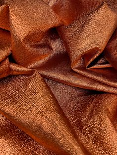 a close up view of an orange fabric