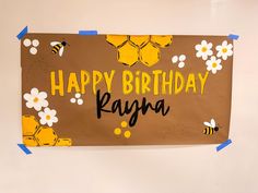 a happy birthday sign with bees and flowers on it that says, happy birthday kagan