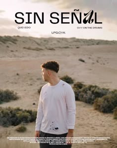 a man standing on top of a sandy beach next to a desert landscape with the words sin senovl