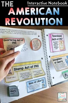 an interactive notebook with the american revolution written on it and hand holding a piece of paper