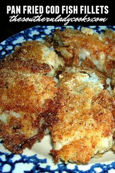 fried fish fillets on a blue and white plate with text overlay that reads pan fried god fish fillets