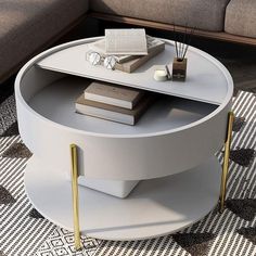 a round coffee table with books on top