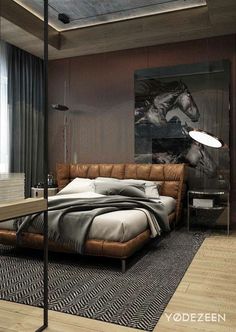 a bedroom with a large bed and black curtains on the window sill next to it