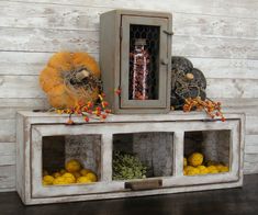 an old cabinet with some fruit in it