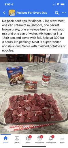 a glass dish filled with meat sitting on top of a counter