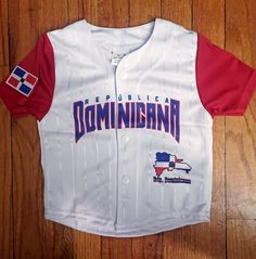 Stylish red, white and blue Puerto Rico flag baseball jersey. 100% Polyester Very comfortable! This design may vary slightly. Sizes (approximate): 0-2 = up to 18 mos. 2-4 = up to 4 years 6-8 = up to 7 years 10-12 = up to 10 years 14-16 = up to 12 years **Please be mindful of your child's size, whether he/she is bigger or smaller than average.** Due to the difference between different monitors, the picture may not reflect the actual color of the item. Thank you!   Note: Your item will be sent to Dominican Republic Clothing, Caribbean Dress, Dominican Flag, Dominican Republic Flag, Flag Dress, Baseball Jersey Shirt, Porto Rico, Mesh T Shirt, Fashion Illustration Dresses