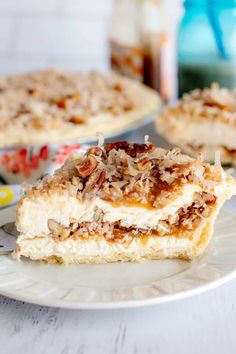 two pieces of pie sitting on top of a white plate