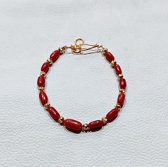 Antique Coral Bracelet, 100% Natural Italian Red Coral Bracelet, Red Coral Handmade Charming Bracelet, Best Quality Smooth Beads Bracelet... Gemstone : Natural Red Coral  Bracelet Weight : 24.45 Carat   Bracelet Length;- 7 Inches  Color : As Seen In Picture Payment policy We accept the payment via PayPal only. Shipping policy We Ship the item as per our shipping policy once we receive the payment. We understand that getting your items quickly is important to you, so we make every effort to proce Traditional Red Hand-strung Bracelet, Red Beaded Coral Bracelets, Red Coral Beaded Bracelets With Round Beads, Red Coral Bracelet With Polished Beads, Traditional Red Bracelets With Polished Beads, Red Oval Beaded Bracelets For Gift, Red Beaded Bracelet With Polished Red Coral, Beaded Red Coral Round Bead Bracelets, Red Coral Beaded Bracelets With Polished Beads