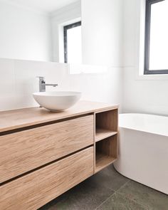 Modern bathroom with timber vanity Timber Vanity Bathroom, Japanese Toilet Design, Bright White Bathroom, Dark Tile Bathroom, Bathroom Concrete Floor, Timber Bathroom, Timber Bathroom Vanities, Bathroom Vanity Modern, Oak Bathroom Furniture