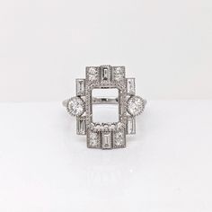 Gorgeous art deco inspired ring semi mount in 14k Gold with milgrain detailing and baguette and round Lab diamond accents, which can be upgraded to natural diamonds! A lovely geometric ring to showcase the emerald cut gemstone of your choice! Specifications Item Type: Ring Semi Mount Head size: 10x8 mm Shape: Emerald cut Metal: 14k/4.63g Lab Diamonds: 16/1.05 cttw SKU: AJR1072/3425 This ring is made with solid 14K Gold and lab diamonds. FREE SHIPPING AND FREE RETURNS means that you can try anyth Designer Silver Jewellery, Jewelry Showcases, Jewelry Safe, Geometric Ring, Gorgeous Art, Earring Findings, Pendant Bracelet, Art Deco Style, Lab Diamonds