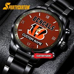 NFL Cincinnati Bengals Watch Custom Football Black Fashion Watch For Fans Introducing our Black Stainless Steel Watch, a symbol of sophistication and durability. Crafted with precision, its sleek black stainless steel case and strap offer a modern aesthetic. With precise quartz movement and scratch-resistant glass, it ensures reliability and style. Elevate your wrist game with [...] Modern Wear-resistant Stainless Steel Watch Accessories, Black Wear-resistant Watch For Gift, Black Digital Watch For Business, Business Watch Accessories In Stainless Steel, Black Digital Watch With Round Dial For Business, Wear-resistant Black Digital Watch With Round Dial, Black Digital Watch For Business With Round Dial, Black Digital Watch With Wear-resistant Round Dial, Wear-resistant Stainless Steel Watch