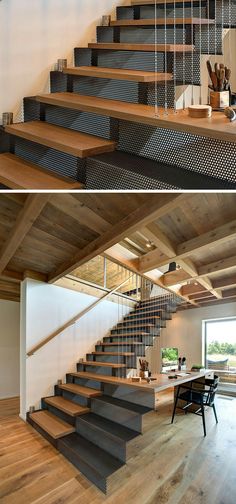 the stairs in this modern house are made from metal and wood