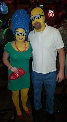 a man and woman dressed up as characters from the simpsons are posing for a photo