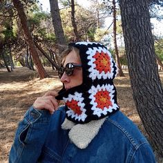 Crochet Balaclava The Crochet Granny Square Balaclava is a charming and cozy winter hat perfect for embracing the holiday season.  ❤️Handcrafted with love, this unisex balaclava combines the classic granny square crochet technique with modern winter fashion. The intricate crochet work showcases festive colors and patterns, making it a delightful Christmas balaclava. It's a unique and thoughtful handmade gift idea, offering warmth and style during the chilly winter months. Stay snug and stylish with this one-of-a-kind winter accessory. 🎁 A Thoughtful Gift Looking for a unique gift for someone special? Our Balaclava makes an excellent present for friends and family. It's a thoughtful way to keep your loved ones warm and stylish in the winter months ✨ It is recommended to hand wash at 30 deg Winter Vintage Crochet Yarn Hat, Vintage Winter Crochet Hat, Handmade Retro Crochet Hat For Winter, Hand Knitted Crochet Hat For Winter Festivals, Retro Handmade Crochet Hat For Winter, Vintage Hand Knitted Crochet Hat For Winter, Retro Winter Crochet Hat Made Of Yarn, Vintage Hand-knitted Crochet Winter Hat, Retro Crochet Beanie Hat For Winter