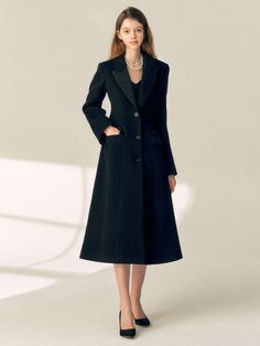 Editor's NotesThis A-line long coat has simple design with tailored collar addressing classic mood. Coat yourself with this coat creating elegant feminine look.- Peaked lapel notch collar in silk- Cashmere wool blend fabric with subtle shine- Single breasted with real horn buttons- A-line silhouette flaring from waist line- Side pocketsMeasurements(in.)0 / 1 / 2 / 3- Total Length: 46.81 in. / 47.05 in. / 47.32 in. / 47.56 in.- Shoulder: 15.91 in. / 16.42 in. / 16.93 in. / 17.40 in.- Sleeve Length: 24.49 in. / 24.72 in. / 25 in. / 25.24 in.- Sleeve Circumference: 13.66 in. / 14.13 in. / 14.65 in. / 15.16 in.- Chest Circumference: 35.51 in. / 37.52 in. / 39.53 in. / 41.54 in.- Waist Circumference: 26.46 in. / 28.46 in. / 30.47 in. / 32.48 in.- Hip Circumference: 41.61 in. / 43.62 in. / 45.63 Elegant Tailored A-line Outerwear, Elegant A-line Outerwear For Work, Elegant A-line Formal Outerwear, Formal Fitted A-line Wool Coat, Classic Tailored A-line Outerwear, Formal A-line Wool Coat For Fall, Elegant Tailored Outerwear With Lapel Collar, Tailored Elegant Outerwear With Lapel Collar, Evening Wool Coat With Lapel Collar For Winter