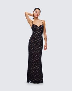 The art of seduction 😌 Everyone will be drawn to your mystery in this black lace maxi dress made from stretch lace fabric and complete with bust pads, adjustable straps, and a scalloped edge along the neckline and hem 🖤 Formal Lace Back Slip Dress, Formal Lace Slip Dress With Lace Back, Lace Back Slip Dress For Date Night, Elegant Black Lace Dress With Spaghetti Straps, Elegant Fitted Maxi Dress With Contrast Lace, Evening Lace Maxi Dress With Spaghetti Straps, Evening Maxi Dress With Spaghetti Straps And Lace, Lace Maxi Dress With Spaghetti Straps For Evening, Black Dress With Lace Closure And Spaghetti Straps