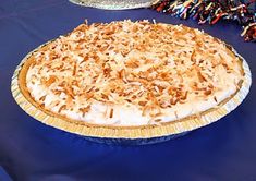 a pie sitting on top of a blue table