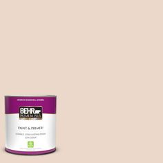 a can of behr paint on a white background