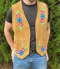 Hand beaded, Ojibwe made, smoked moosehide vest is circa 1950.  It is in excellent condition.  The beadwork is in the Eastern Woodlands style and is appropriate for a man or woman. WE DO NOT SHIP INTERNATIONALLY.  Free shipping only within the continental United States. Returns:  Carefully review the description of the item and the pictures.  If you have any questions, please ask before ordering.  We do not, in general, issue refunds, but may be considered on case-by-case basis.  Refund will not Ojibwe Beadwork, Eastern Woodlands, Native American Clothing, Hand Embroidery Patterns Flowers, Beadwork Patterns, Hand Embroidery Patterns, Bead Jewellery, Hand Beading, Moose