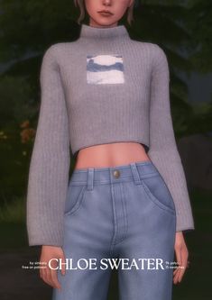 a woman in grey sweater and jeans standing next to trees