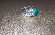 Very powerful talismanic Original Turquoise  (Feroza) stone 925 sterling silver ring.  This is one of its kind of unique ring.  A powerful djinn/ moakkal will be attached with this ring according to the need of an individual.  Name and mother's name will be needed to attached right djinn/moakkal with this ring which will help you from unseen in your life.  Specially this will give you spiritual boost, increase your respect, will give you positive whispers etc. Results can be seen in due time.  R Spiritual Turquoise Ring With Natural Stones, Traditional Adjustable Turquoise Ring As Gift, Traditional Adjustable Turquoise Ring, Traditional Adjustable Turquoise Ring For Gift, Adjustable Traditional Turquoise Ring As Gift, Spiritual Round Turquoise Ring, Bohemian Engraved Turquoise Ring For Gift, Spiritual Turquoise Healing Ring, Spiritual Healing Turquoise Ring