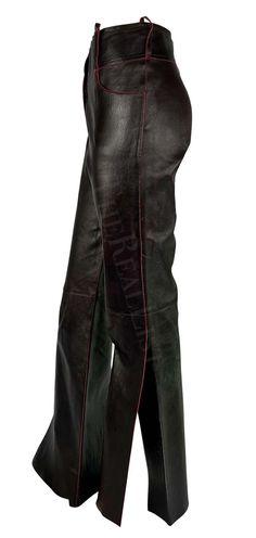 For Sale on 1stDibs - TheRealList presents: a fabulous pair of brown/red leather Christian Dior pants, designed by John Galliano. From the Fall/Winter 2001 collection, these Elegant Brown Leather Pants Full Length, Elegant Full-length Brown Leather Pants, Elegant Brown Full-length Leather Pants, Elegant Full Length Brown Leather Pants, Brown Fitted Luxury Pants, Luxury Fitted Brown Pants, Fitted Luxury Brown Pants, Luxury Leather Formal Pants, Luxury Brown Leather Bottoms