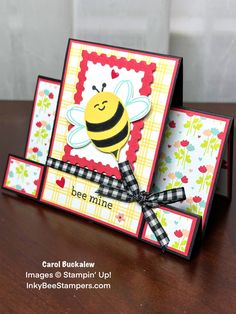 a close up of a card with a bee on it and the words be mine