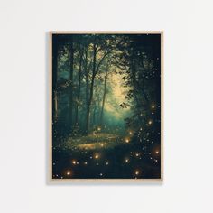 an image of a forest with fairy lights on the ground and trees in the background