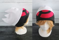 These hats are made from fleece. The white part of the hat is malleable and pictures are an example of what you can do with it. ⫸ Perfect for: fans, cold weather, costumes, or conventions. Very warm! ⫸ Size: Fits anyone age 5+, one size fits most. Circumference about 24-25 in.⫸ Care instructions: I recommend hand wash but should be fine in machine wash cold.All hats are made in a smoke-free, pet-free environment. All hats are made with a sewing machine. Patterns and designs are drawn, cut, and m Weather Costumes, Sapphire Pokemon, Pokemon Hat, Fleece Hat, Red Design, Blue Band, What You Can Do, Sewing Machine, Cold Weather