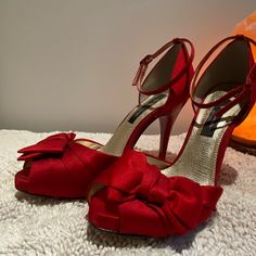 Nwt , No Box. Nina Red Rouge Luster Satin Peep Toe Heels With Bow And Ankle Strap. Heel Is Approximately 4.75”. Red Ankle-high Heels With Heel Strap, Ankle-high Red Heels For Formal Occasions, Red Ankle-high Heels With 4-inch Heel, Red Heels With Round Toe And Bow, Red Ankle-high Evening Heels, Party Heels With Red Bow And Round Toe, Elegant Ankle-high Red Heels, Elegant Red Ankle-high Heels, Red High Heel Evening Shoes