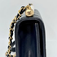 Chanel 2019 Quilted Small Chic Pearl Flap Bag with Interlocking CC Turn-lock and Gold-tone Hardware (with Dustbag) Designer = Chanel Color = Black Material = Leather Condition = Very Good Height = 6 Width = 8.5 Depth = 1.5 Class = Premier Location: Chicago Item Number: 19740-126 Item ID: 298142 Category: Shoulder Bag Classic Evening Bag With Lock, Timeless Black Flap Bag With Turn-lock Closure, Luxury Black Flap Bag With Turn-lock Closure, Designer Black Flap Bag With Turn-lock Closure, High-end Black Bag With Turn-lock Closure, Classic Crossbody Bag With Lock, Classic Double Flap Bag With Branded Hardware, Designer Black Shoulder Bag With Lock, Modern Black Shoulder Bag With Lock