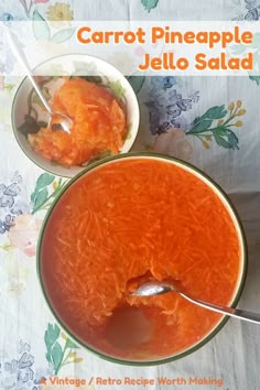 carrot pineapple jello salad in a bowl with spoon and napkin on the table