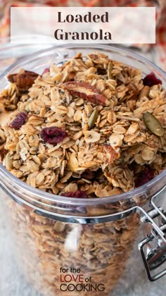 granola in a glass bowl with text overlay that reads loaded granola for the love of cooking