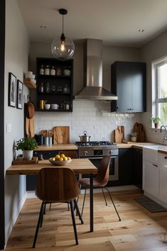 the kitchen is clean and ready to be used for cooking or dining, as well as eating utensils