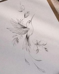 a drawing of a bird with flowers on it's back and wings in the air