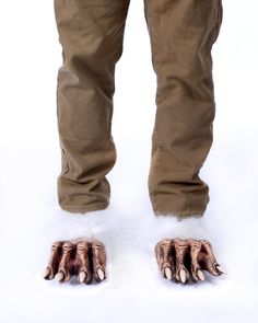 These White Animal Hooves, fit over the shoe and incorporate 1-inch elastic straps for securement. Foam inserts prevent feet from collapsing. Natural latex fronts and synthetic faux fur backs. Hand-poured, painted and assembled in the USA. Werewolf Beast, Aaron Lewis, Head Sock, Monkey Costumes, Fur Costume, Ape Monkey, Trick Or Treat Studios, Uv Black Light, Dark Complexion