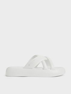 These sandals will become an instant favourite in your summer rotation. Featuring an asymmetric strap design in a slip-on format, they are a charming yet effortless pair that you can slip into on balmy days. In crisp white, they will brighten up shorts, dresses and more. With the added comfort of soft, padded soles, you can wear these all day on your vacations and weekend adventures. Buckle Loafers, Weekend Adventures, Online Shopping Shoes, Quick Outfits, Loafer Mules, Charles Keith, Blue Sandals, Sport Sandals, Strap Design