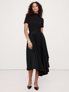 Our iteration of the season's pleated midi skirt relies on a twill fabric we love for its soft structure, which give it the ability to hold crisp pleats that layer in asymmetric panels for an architectural effect.  High waisted.  A-line.  Zip closure at side.  Unlined. Thai Orchid, Asymmetrical Midi Skirt, Sequin Midi Skirt, Maxi Styles, Women's Skirts, Pleated Midi Skirt, Style Mistakes, Twill Fabric