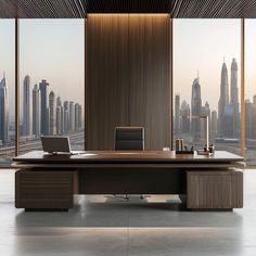 an office desk with two laptops on it in front of large windows overlooking the city