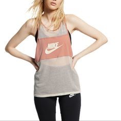 Steal The Show In The Nike Sportswear Tank, The Perfect Mash-Up Of Mesh And Jersey Fabric That You Can’t Help But Notice. Playful Design Lines Add Fresh Dimension To A Classic Item. Features Mesh Fabric Is Breathable Jersey Fabric Feels Soft And Comfortable Standard Fit For A Relaxed, Easy Feel Specifications Body: 65% Polyester / 35% Cotton Overlays: 100% Cotton Tennis Tops, Running Tank Tops, Nike Tank, Nike Dri Fit Shorts, Nike Tank Tops, Red Nike, Running Shirts, Nike Tees, Workout Tank Tops