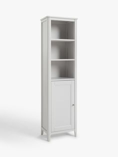 a white bookcase with doors and shelves on the front, against a white background