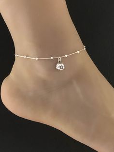 "Sterling Silver Soccer Ball Anklet Minimalist and Dainty Beaded Soccer Mom Anklet ANKLET FEATURES: Metal: All components are made from solid .925 Sterling Silver Model is wearing 10\" in length solid .925 Sterling Silver Bead Chain Chain Length: 9 inch + 1 inch extension Your Dainty Beaded Soccer Ball Anklet will arrive in a gift box, beautifully wrapped and ready for gifting Please send me a message if you have any questions before or after placing your order. Please also view my policy before Adjustable Bracelet Anklets For Wedding, Dainty White Wedding Anklets, Adjustable Wedding Anklets, Silver Dainty Anklets For Wedding, Silver Beaded Anklets As Gift, White Ankle Strap Anklets As Gift, Elegant Silver Anklets With Tiny Beads, Beaded Anklets With Ankle Strap As Gift, Elegant Silver Anklets With Round Beads