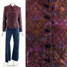 "- Vintage Dark Purple Paisley Satin Bohemian Jacket - Mandarin Collar - Tailored Fit - Lined Fits like: Small Material: Polyester Condition: Excellent Clipped on Mannequin: No ✂ SIZE + FIT ✂ Length: 23.5\" / 60 cm Shoulders, Seam to Seam: 15\" / 38 cm Sleeve: 24\" / 61 cm Bust: 36\" / 91 cm Waist: 34\" / 86 cm All measurements are taken with garment lying flat. ALWAYS refer to measurements as vintage sizes run can vary greatly from todays modern sizes. We recommend comparing measurements above Fitted Silk Bohemian Outerwear, Fitted Bohemian Purple Outerwear, Fitted Purple Bohemian Outerwear, Cotton Voile Dress, Satin Quilt, Paisley Quilt, Bohemian Jackets, Boho Jewels, Quilt Coat