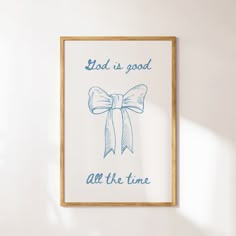 a blue and white framed print with a bow on it's side that says, lord is good all the time