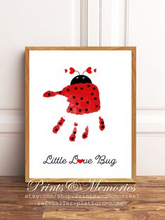 a little love bug print on a wooden frame